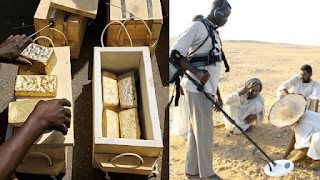 a man holding a gun and a box of food